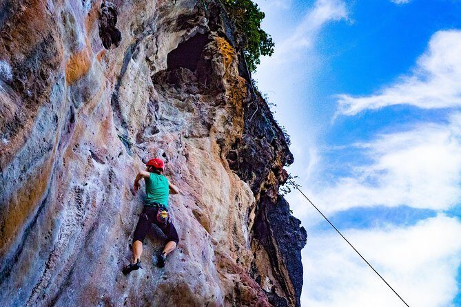 Beginner's Full Day Rock Climbing and Caving Tours at Railay Beach in Krabi - Guide style: why Por and Phon make beginners feel at home