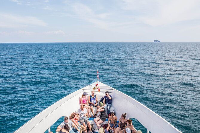 Ferry Transfer from Krabi Klong Jilad Pier to Phi Phi Tonsai - Boarding the Royal Jet Cruiser: ramps, seating, and bags