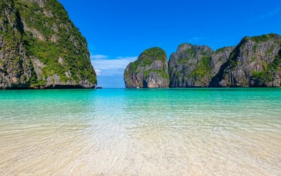 From Ao Nang: Phi Phi Islands Day Tour by Boat with Lunch - What the boat ride feels like: snacks, water stops, and guide help that goes beyond talking