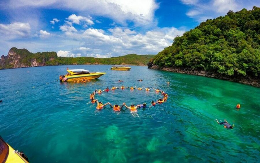 From Ao Nang: Phi Phi Islands Day Tour by Boat with Lunch - Tips that make your day easier: water shoes, waterproof bags, and sunscreen choices
