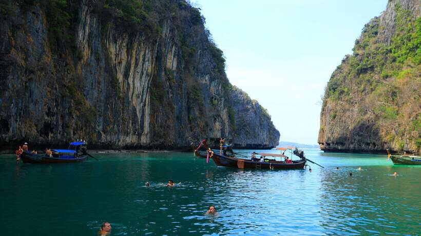 From Phi Phi: Full Day 7 Island Tour by Longtail with Sunset - Bamboo Island: powdery sand and a longer break from the boat