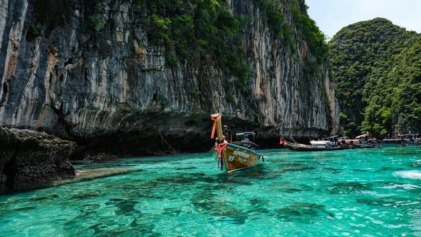 From Phi Phi: Maya Bay HalfDay Longtail Boat with Snorkeling - The Maya Bay national park fee you must budget