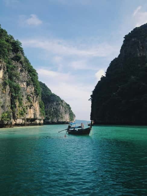 From Phi Phi: Maya Bay HalfDay Longtail Boat with Snorkeling - 2:00 PM departure: sunset and optional glowing plankton