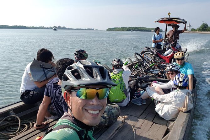 Half day Koh Klang culture cycling - Getting to Koh Klang: hotel pickup and the long-tail boat moment