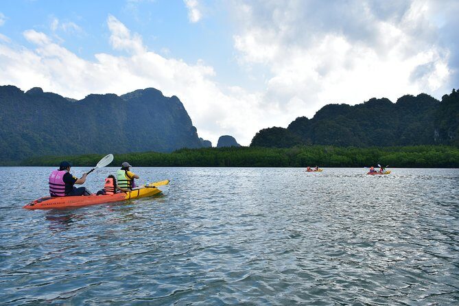 Half-Day Sea Kayaking Adventure in Ao Thalane Bay from Krabi - The guide experience: English, pacing, and photo-friendly moments