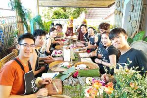 Home Style Family class with fruit carving and market tour - The market walk: ingredients, herbs, and real Thai browsing