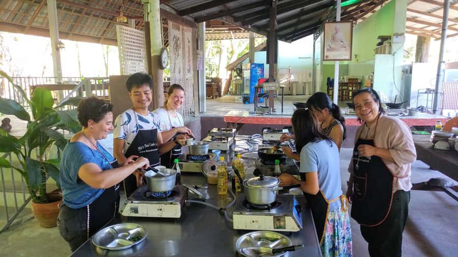 Krabi: Morning/Afternoon Thai Cooking Class at Ya's Cookery - Getting there: hotel pickup and a cooking school by a stream