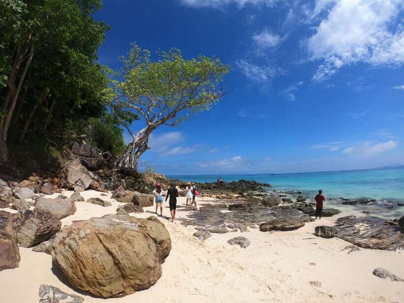 Krabi: Phi Phi Islands Speedboat Tour with Buffet Lunch - Getting on the boat: pickup timing and how the day starts