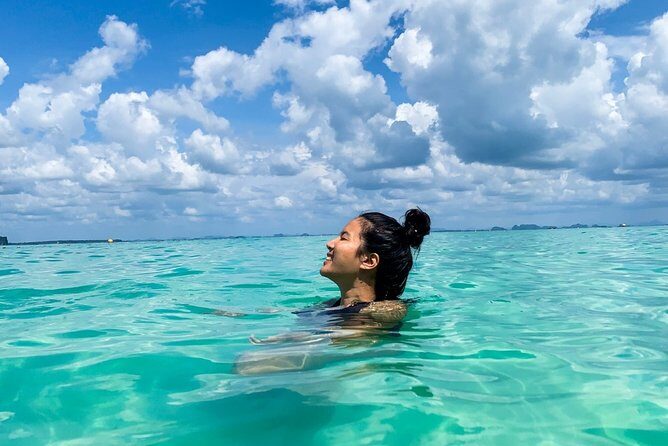 Longtail Boat Private Charter Tour to Krabi 4 Islands - Tup Island and tide timing near Chicken Island