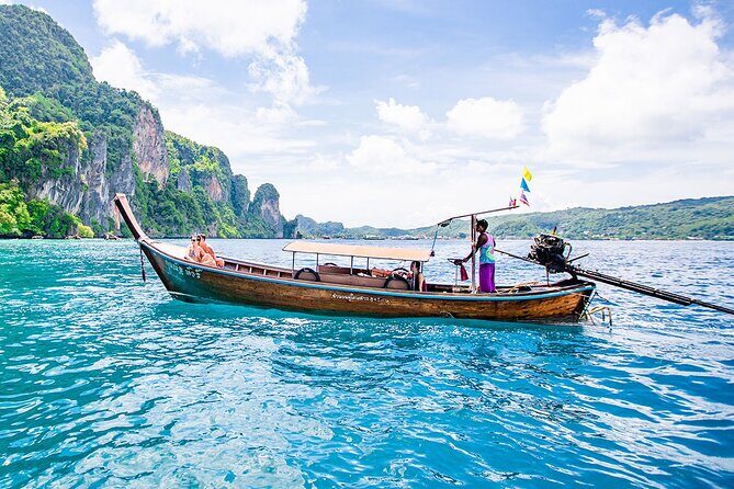 Phi Phi Island Half Day Tour From Phi Phi by Longtail Boat - Stop 1: Koh Phi Phi Leh and the limestone drama from the water
