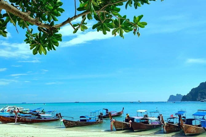 Phi Phi Islands Adventure: Ferry, Snorkeling & Island Lunch - Snorkeling logistics: what’s included, when long-tail boats show up, and what to bring
