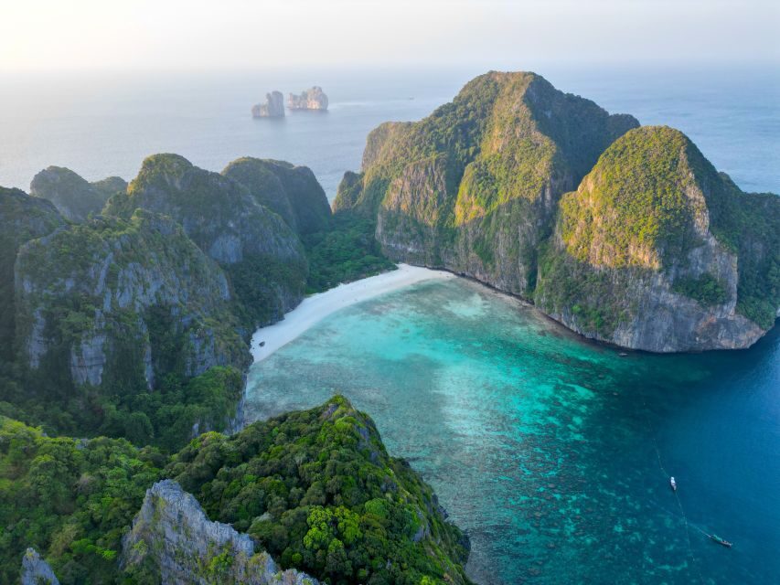 Phi Phi: Maya Bay, Bamboo Island & Plankton Full-Day Tour - Monkey Bay wildlife and the second marine-life snorkel