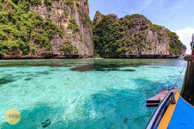 Phi Phi One Day Tour by Speed Boat from Ao Nang, Krabi - Pileh Bay: lagoon swimming with limestone cliffs around you