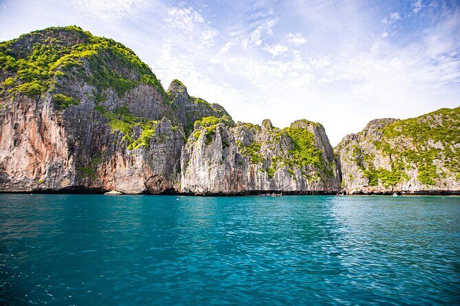 Snorkeling Phi Phi Islands Tour From Phi Phi by Speedboat - The itinerary flow: from Ko Phi Phi Le to Maya Bay photos