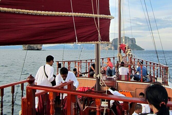 Sunset Dinner Cruise with night Swimming by Luxury Junk Boat - Pirate Beach and Chicken Island: the route’s personality